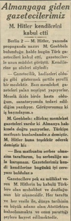  Almanyaya giden gazetecilerimiz M. Hitler kendilerini kabul ett etti Berlin 2 — izim Hitler, yanında propaganda naziri M....