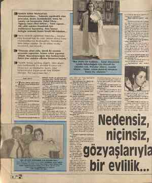  E Atatürk Kültür Merkezi'nin danışmasındayız... Yukarıda yapılmakta olan provadan, tiyatro kostümleriyle inmiş bir sanatçı