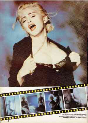  İşte Madonna'nın video-klibinin kesilen sahneleri... Madonna bir camın ardında... Bir iskemleye oturuyor ve baştan çıkarıcı
